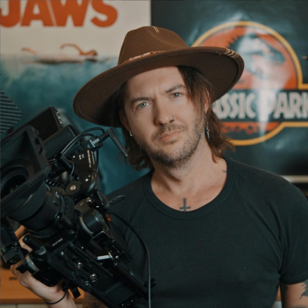 Carl Tomich holding a cinema camera